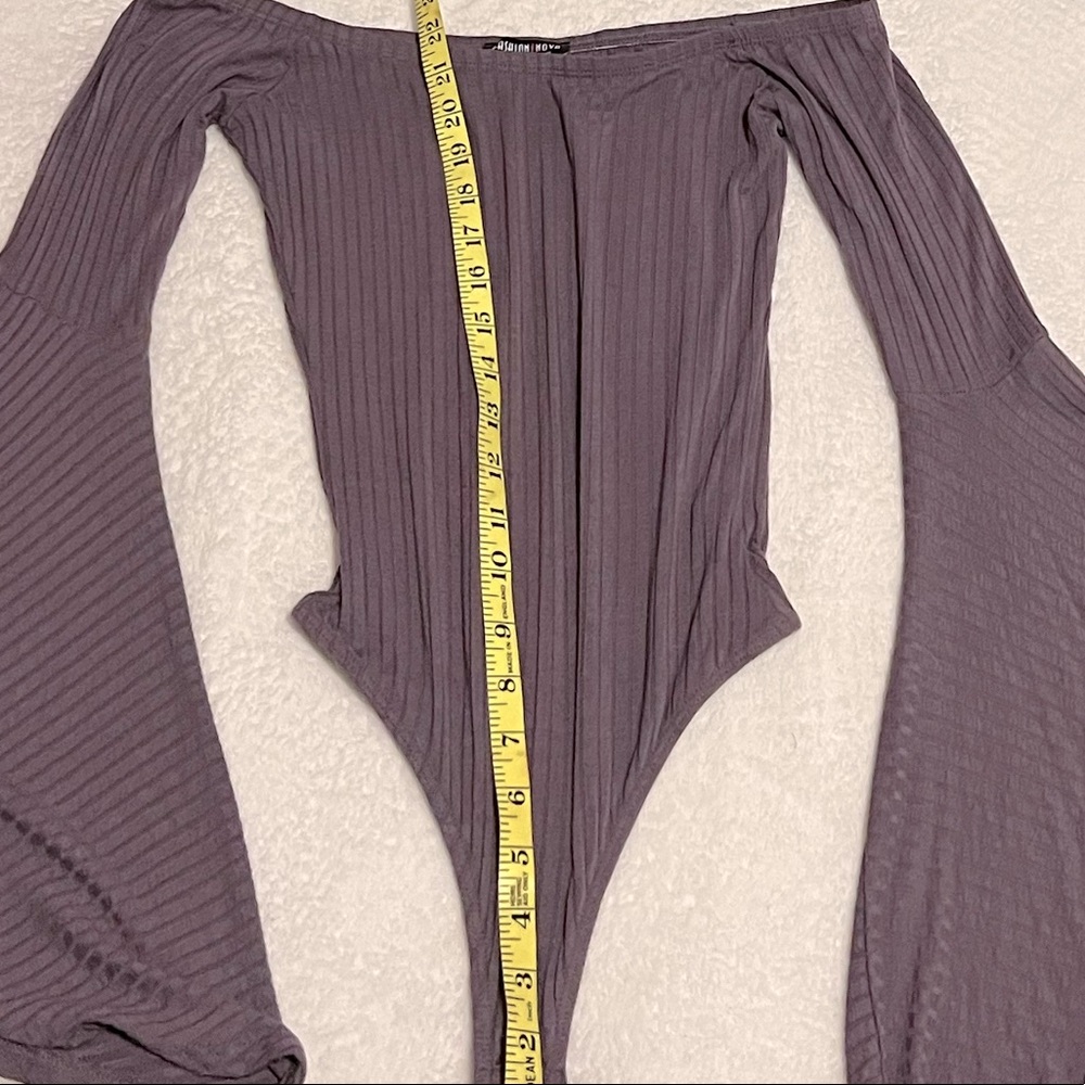 Purple body suit bell sleeves